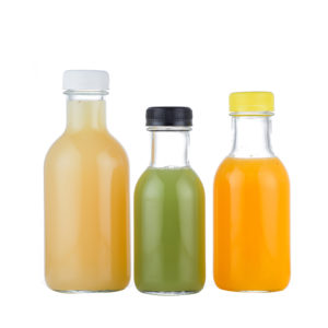Empty-juice-bottles-clear-round-juice-glass-beverage-bottles-wholesale-1