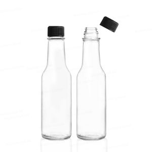 empty glass ketchup bottle